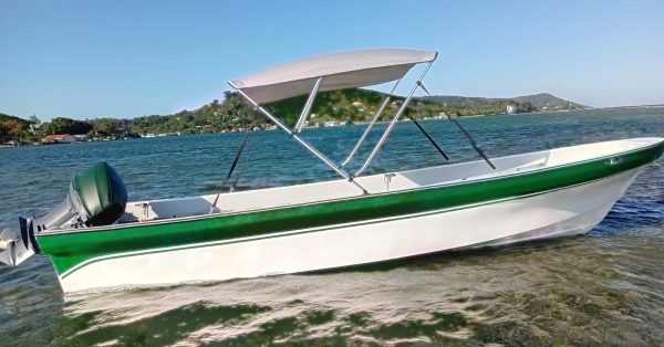 A panga watercraft and guide Jake