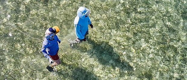 Anglers wading saltwater flats
